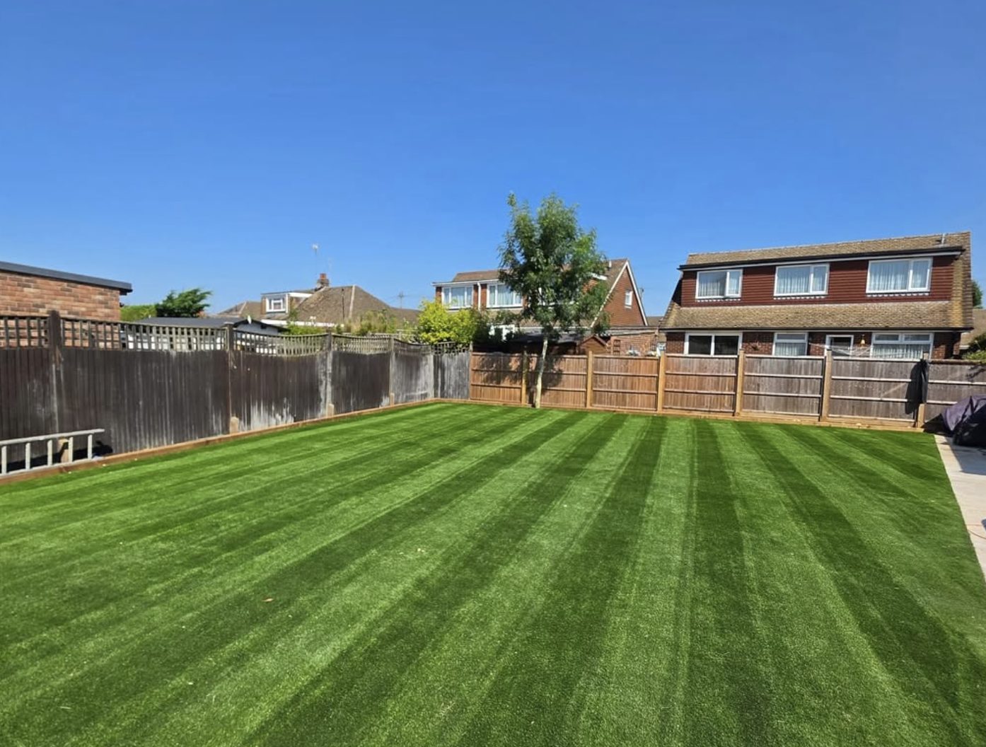 Freshly laid striped turf lawn